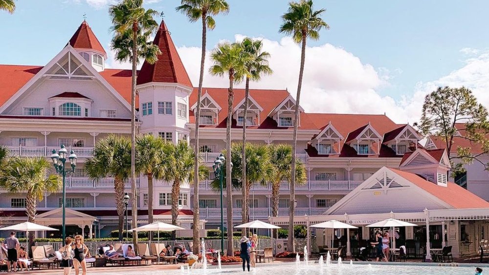 Munch on a bikkie and enjoy the sunshine at Disney's Grand Floridian resort spa. Credits to @disneyista on Instagram