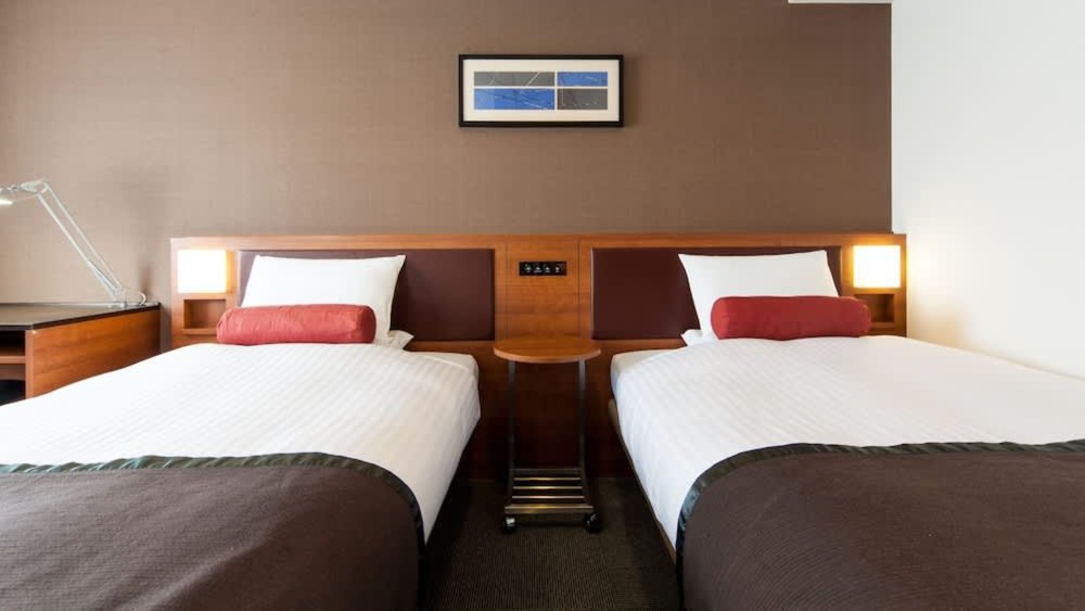 Tuck yourself in bed after a long day exploring the city. Credits to Klook