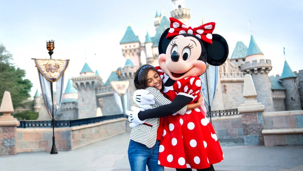 A hug from Minnie Mouse is all it takes to make a day unforgettable at Disneyland!