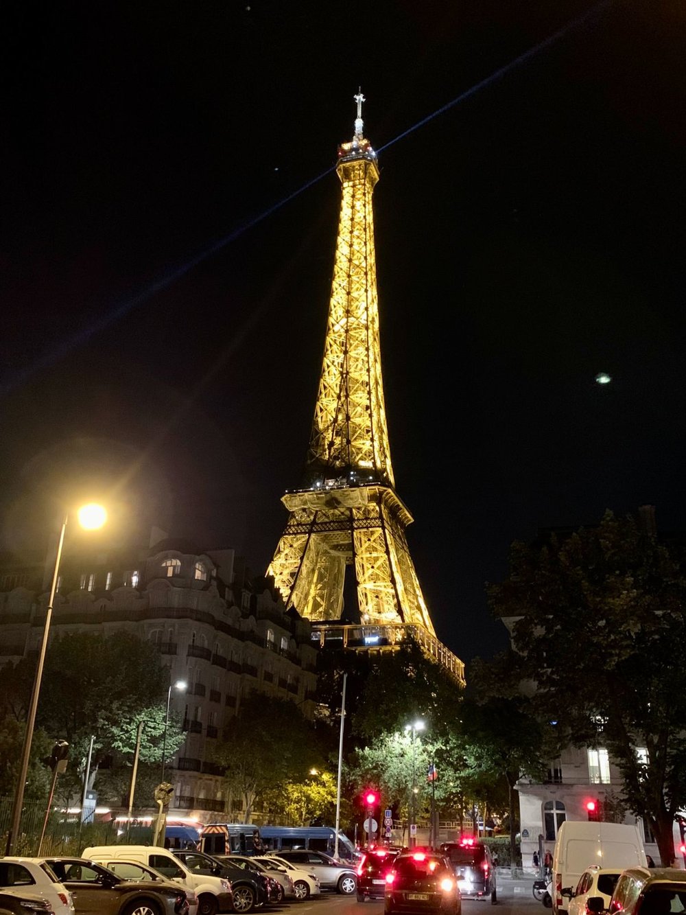 eiffel tower at night with lights on