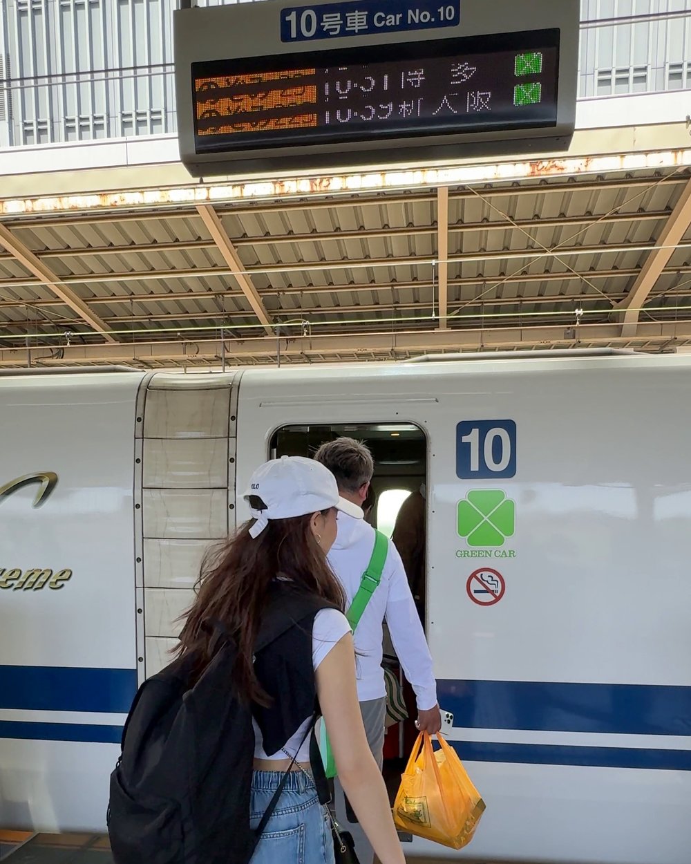 Shinkansen Green Car boarding at the platform