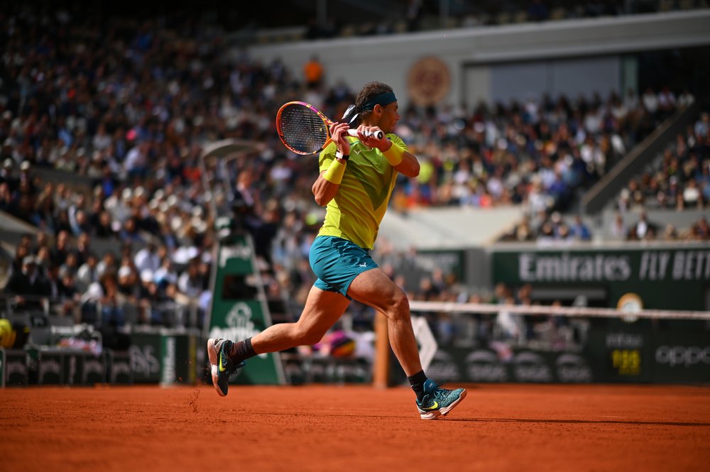 action shot of nadal during roland garros