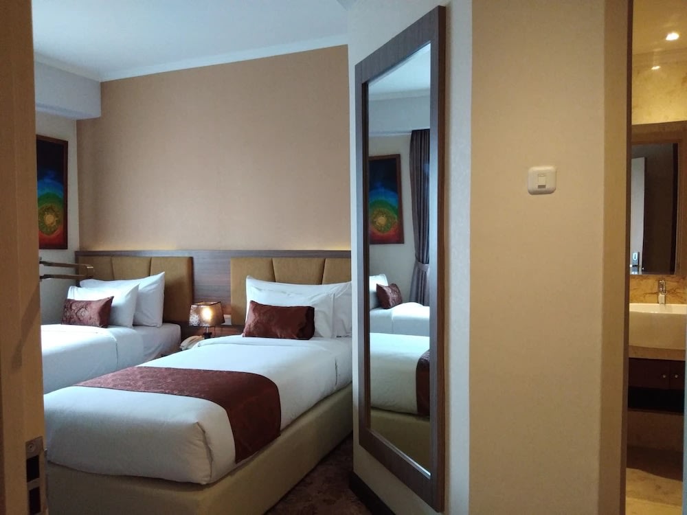 Syariah Hotel Solo - Bedroom