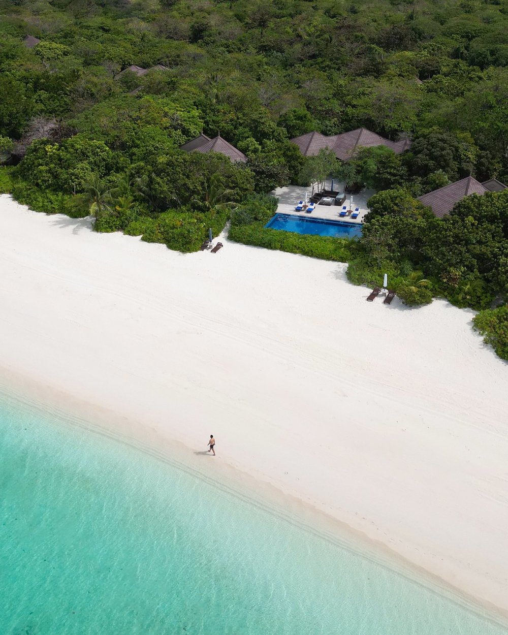 white beach resort in Amanpulo