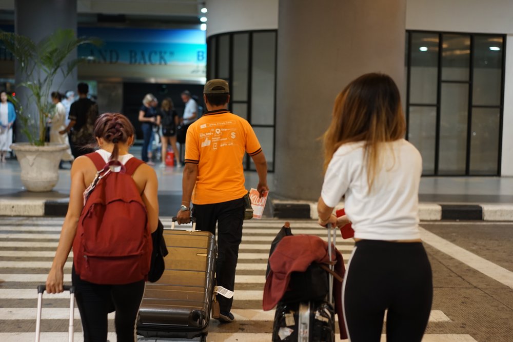 travelers crossing the street
