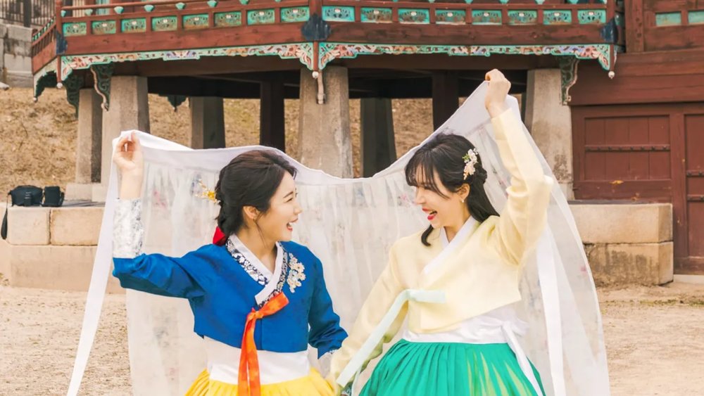 Imagine you and your bestie in hanbok, traditional Korean wear.