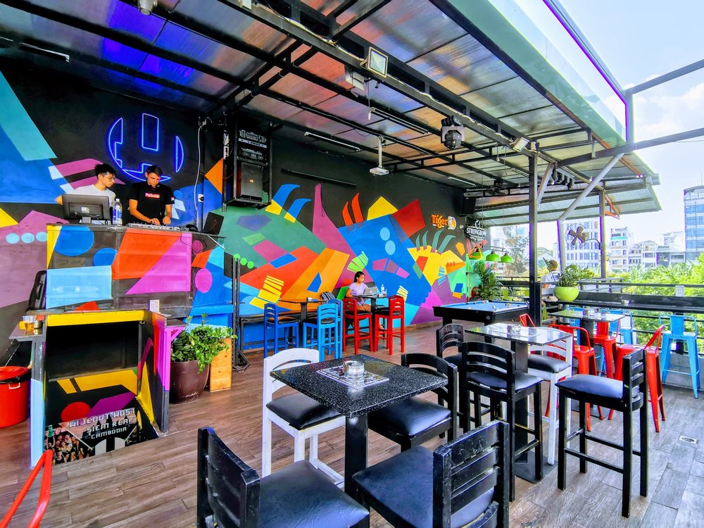 Colorful bar in The Hideout Hostel Saigon