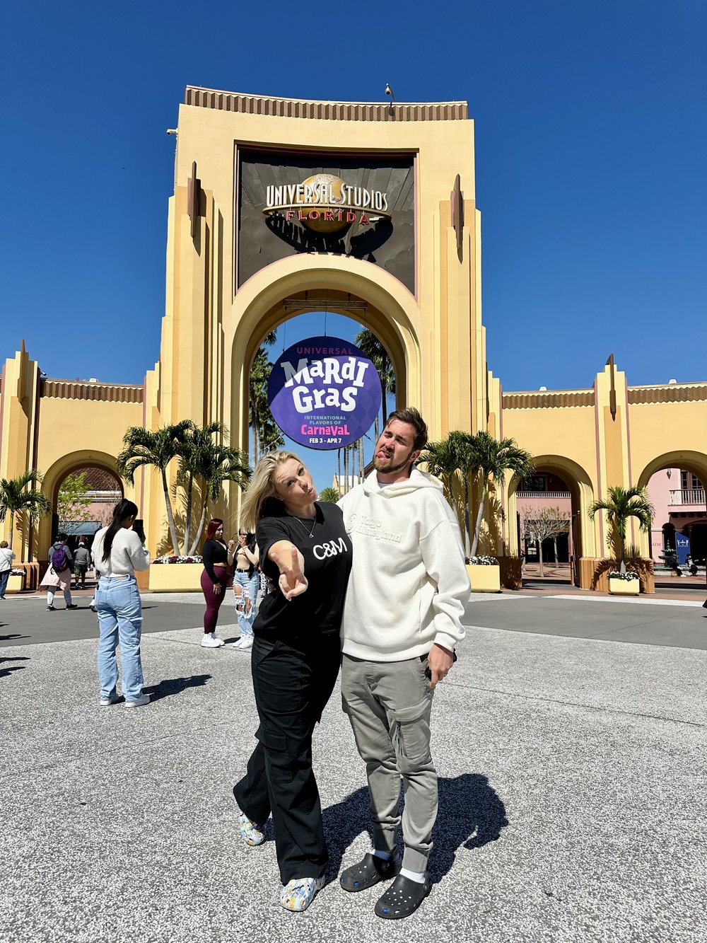 two people by the entrance of universal orlando