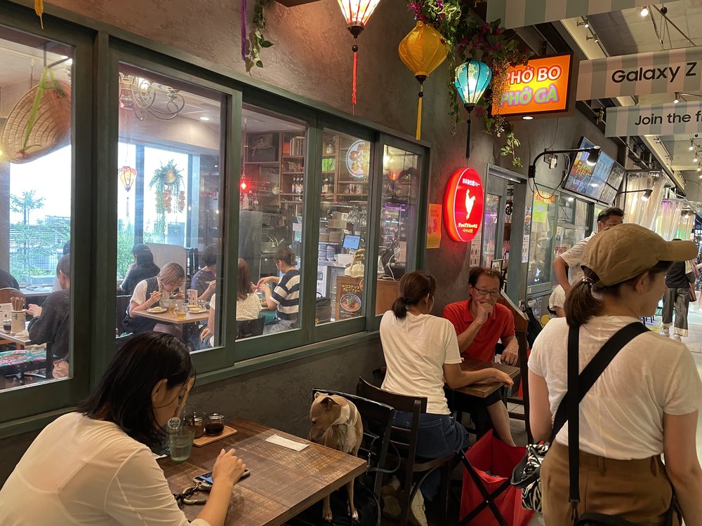 a line of restaurants of different cuisines in shimokitazawa mikan shimokita