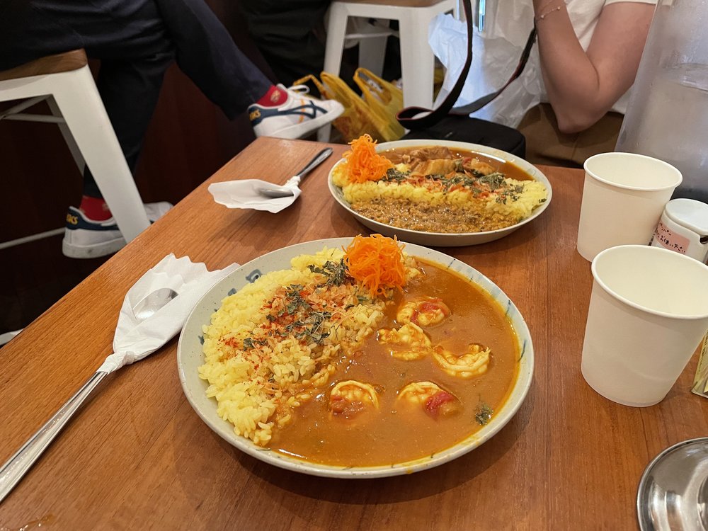 two plates of shrimp curry in shimokitazawa