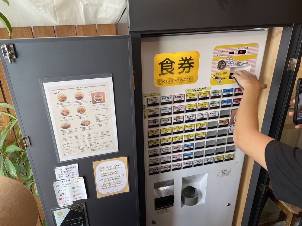vending machine for food orders in a curry shop