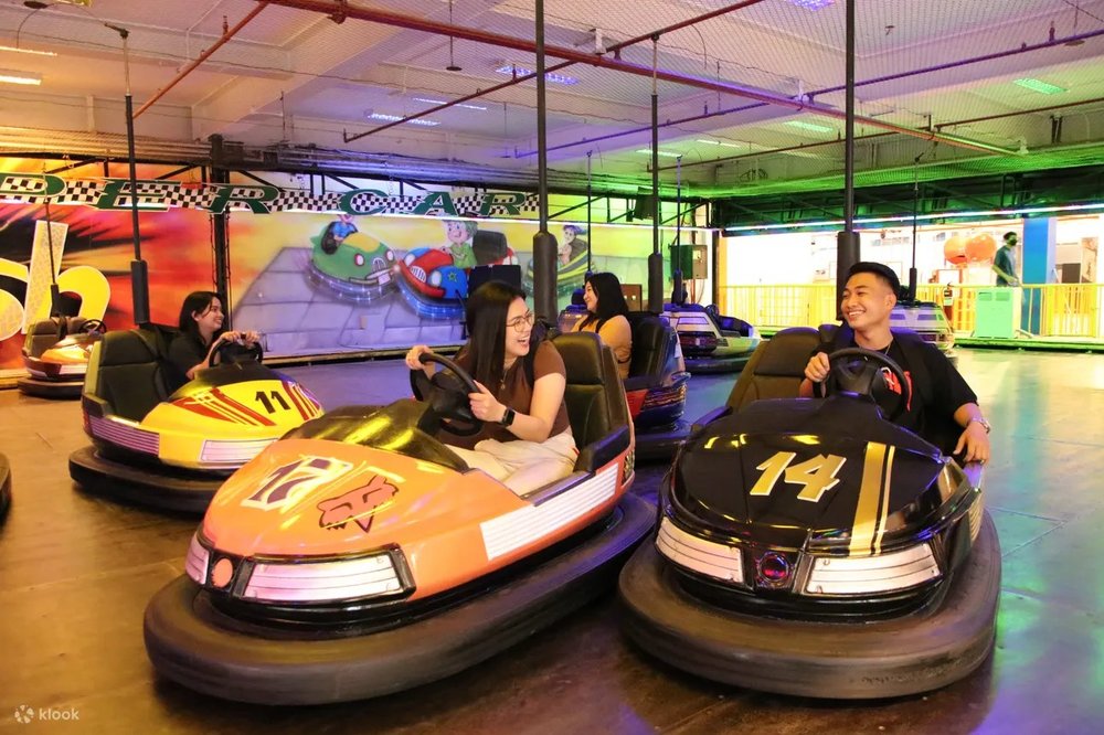 Couple riding a bumper car