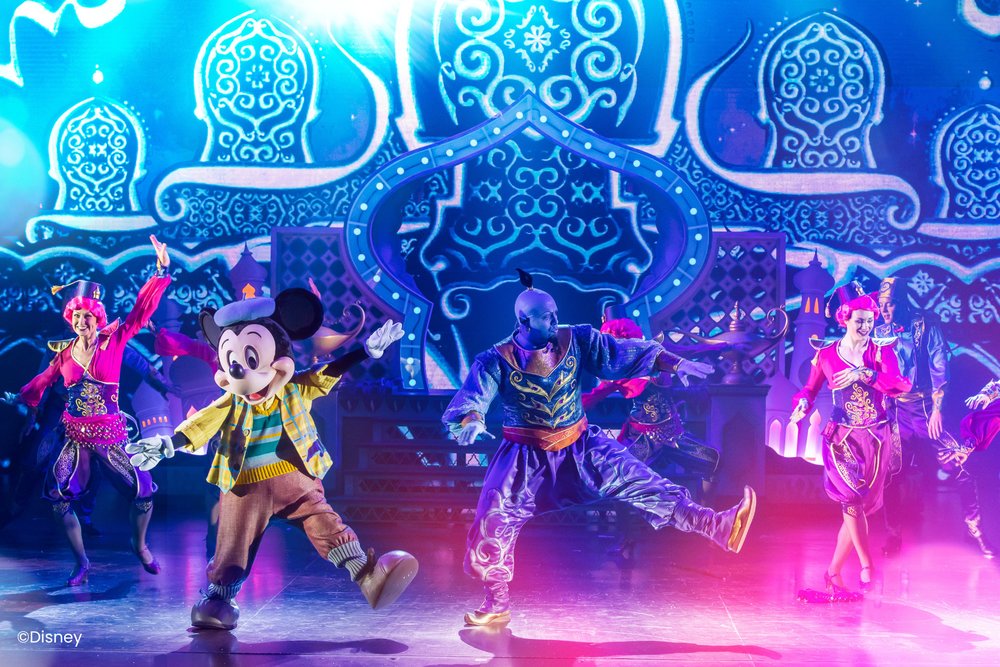 mickey mouse and genie dancing in disneyland paris
