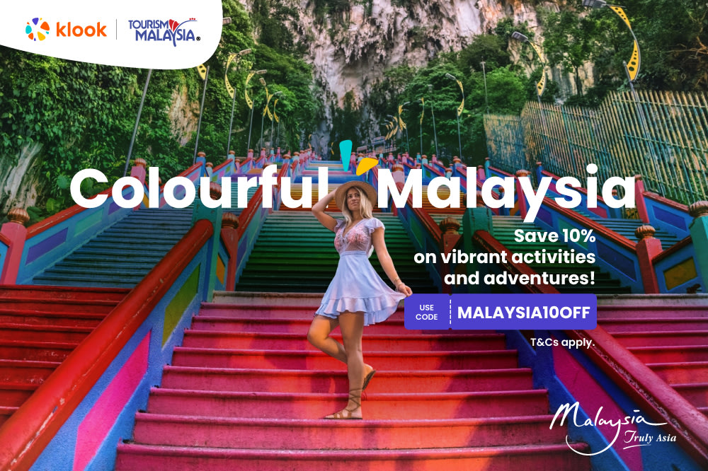 woman posing by colourful steps with text "colourful malaysia"