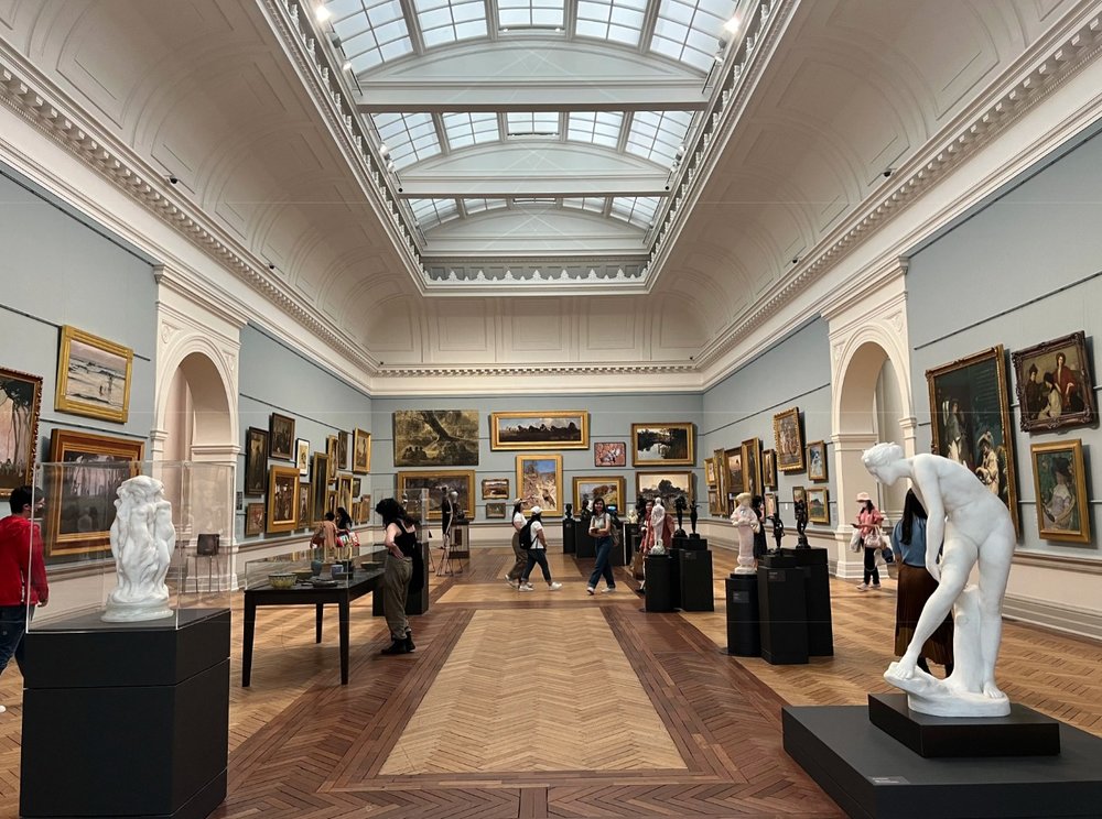 Sculpture and painting inside the art gallery