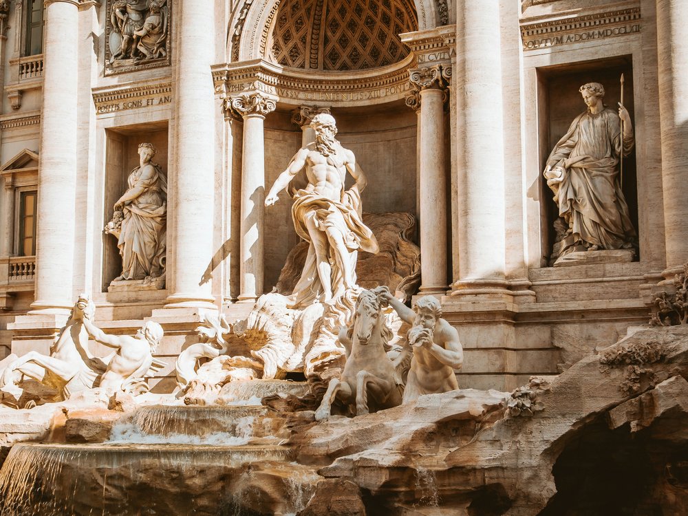 trevi fountain statues in rome during day time