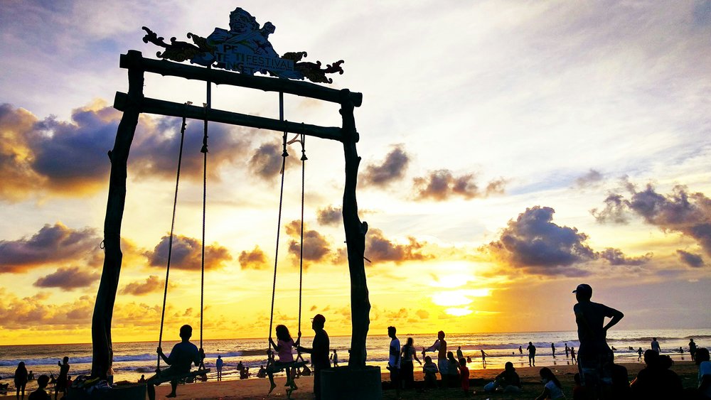 seminyak - petitenget beach sunset swing