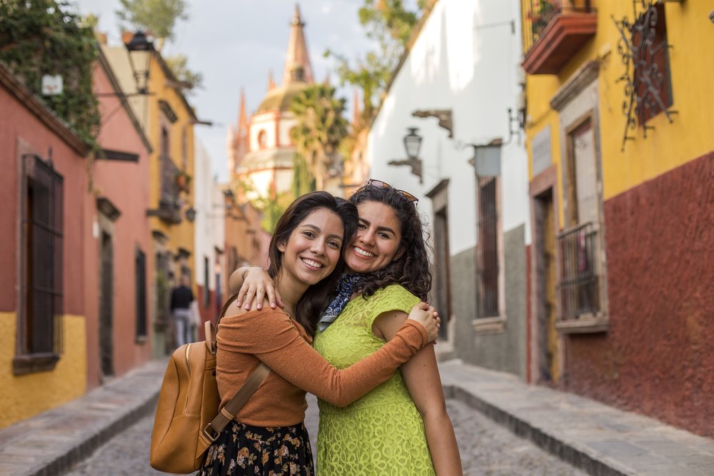 two girls hugging each other
