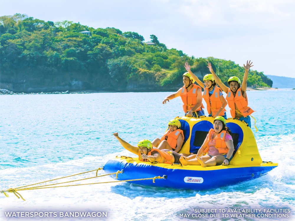Tourist riding watersports bandwagon