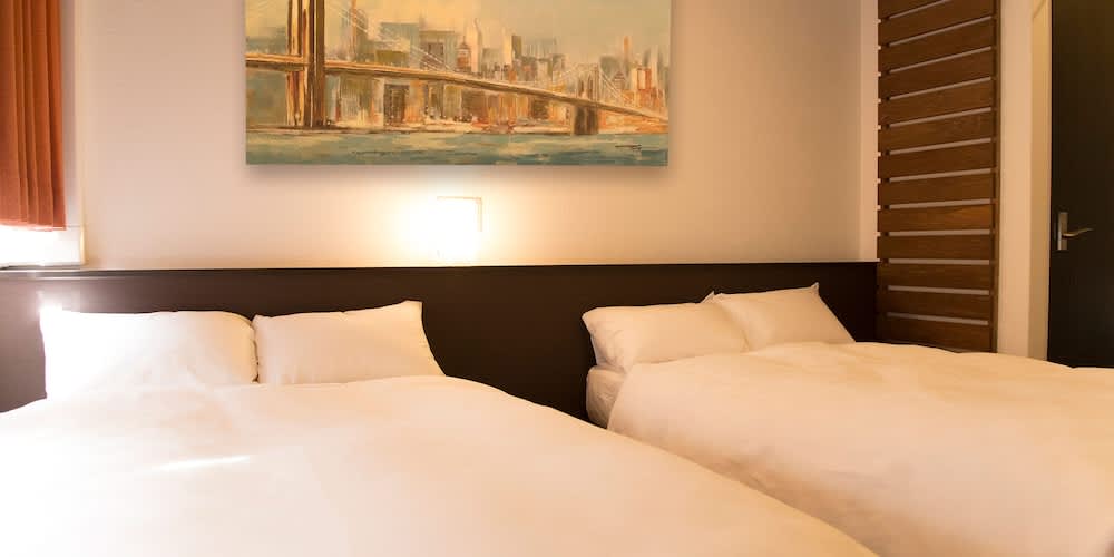 where to stay in osaka near train stations Osaka Port Hotel L’Espoir