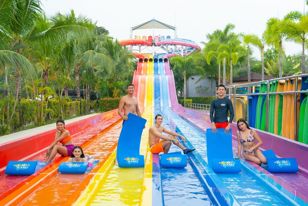 Friends posing in a slide