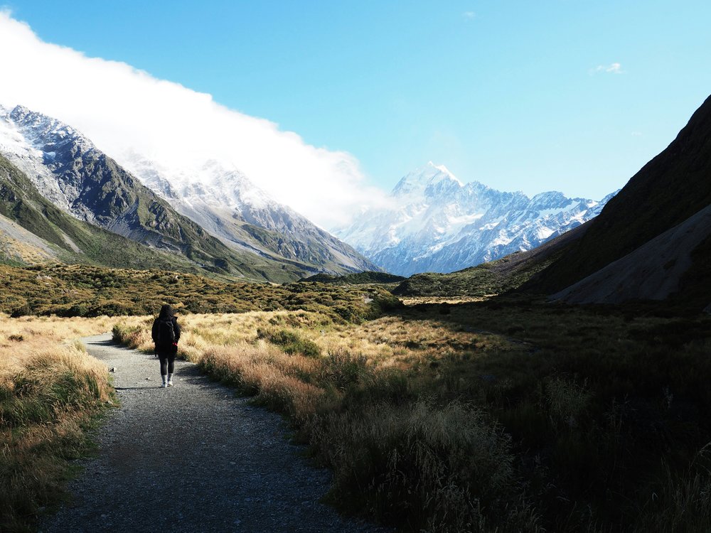 New Zealand South Island Road Trip Itinerary - A traveler exploring Mount Cook National Park