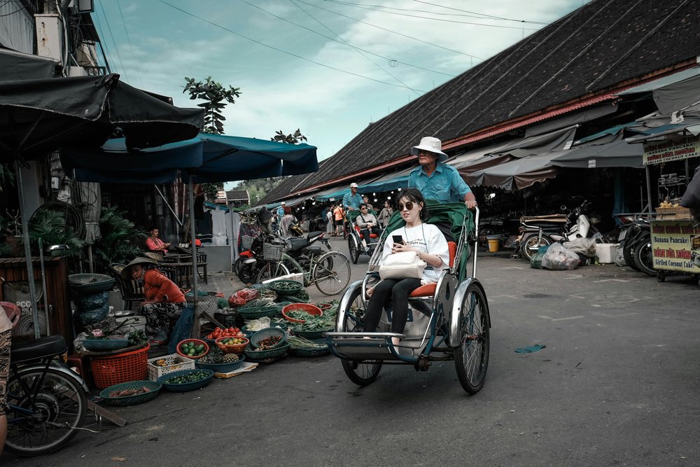 Tourist riding in Cyclos in Vietnam