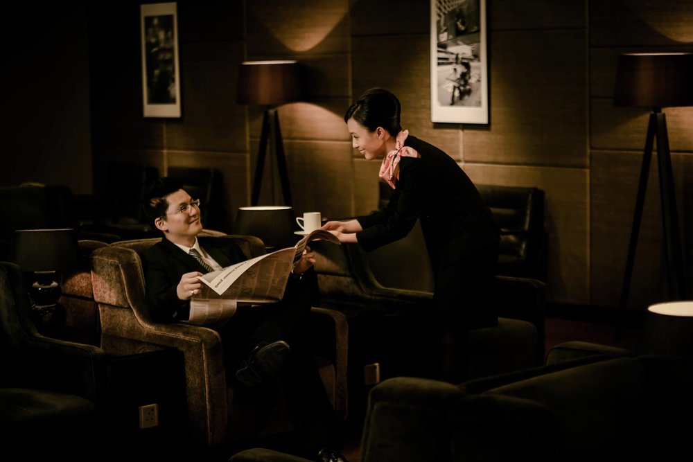 Girl serving a coffee