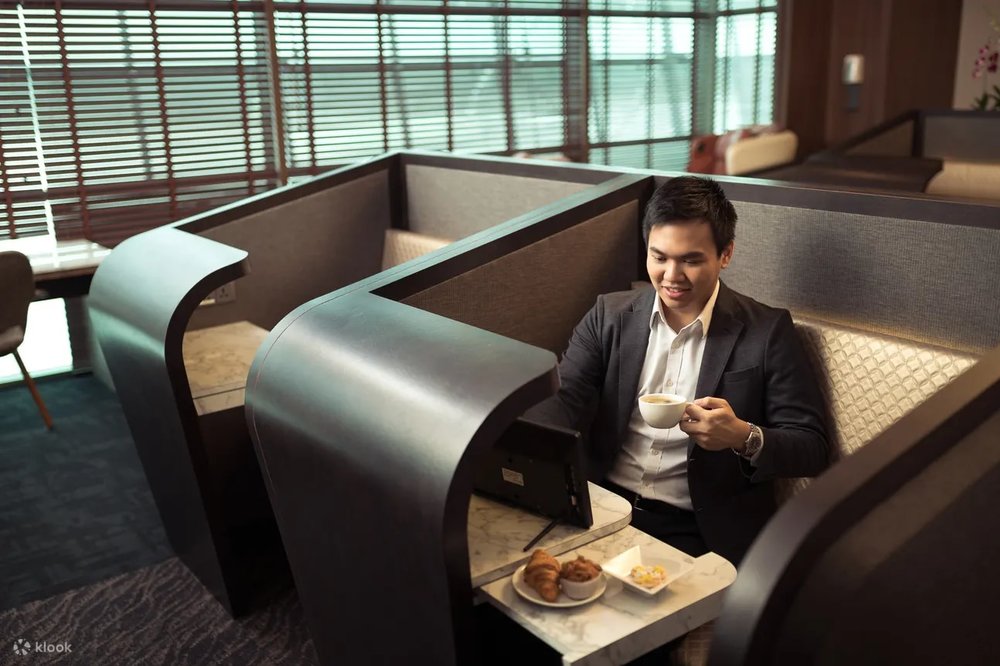 Guy sitting in the lounge