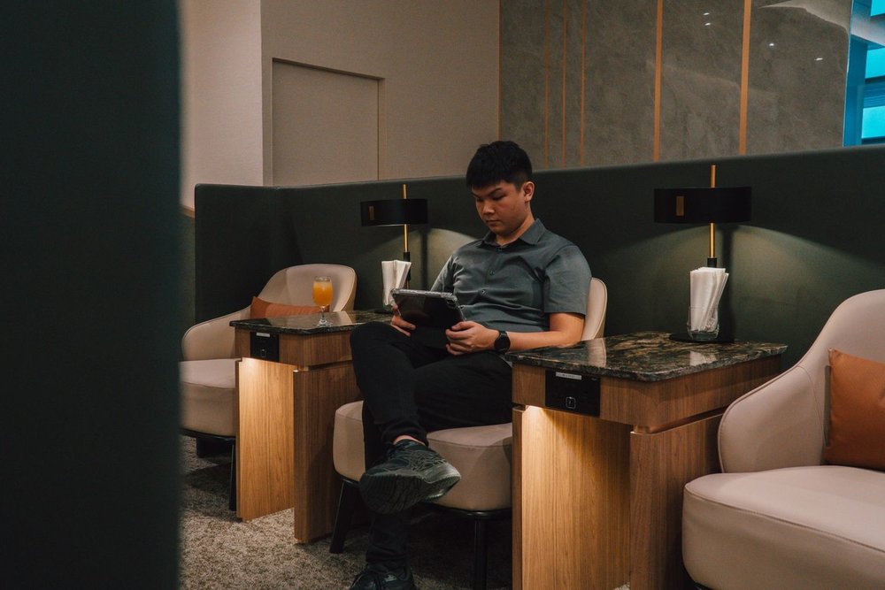 Guy sitting in a lounge