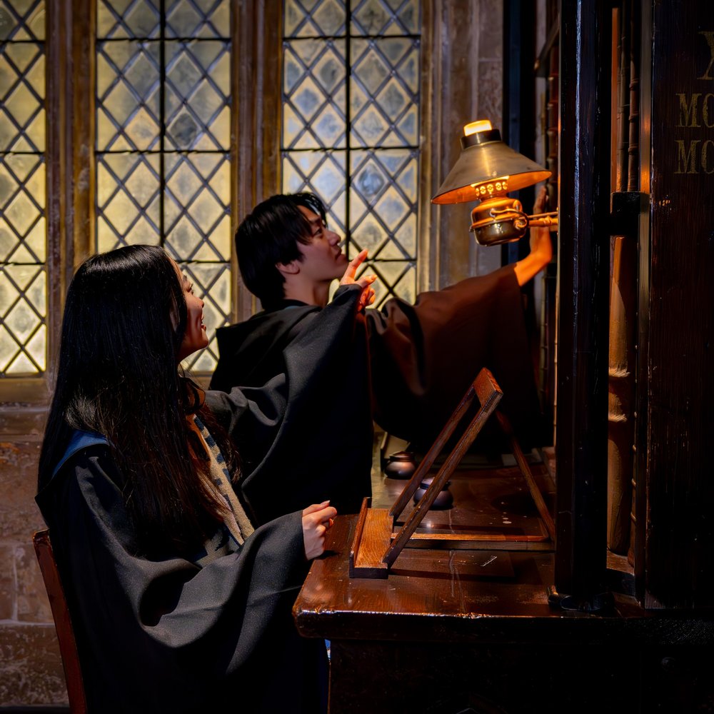Two people solving a puzzle