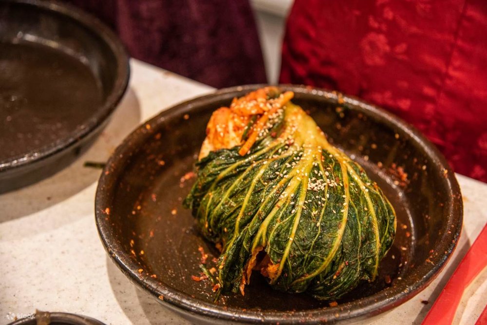 how to make kimchi - whole lettuce kimchi on a cast iron plate