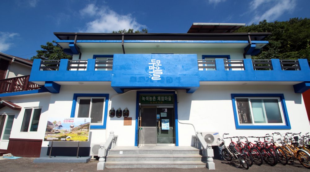 building exterior with a blue wall
