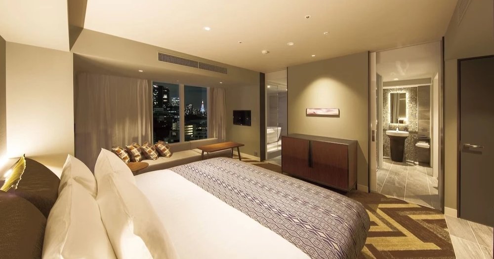 white bed in a hotel room