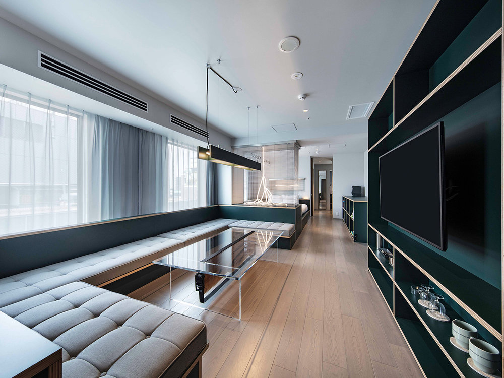 Modern room interior with windows and a wooden floor