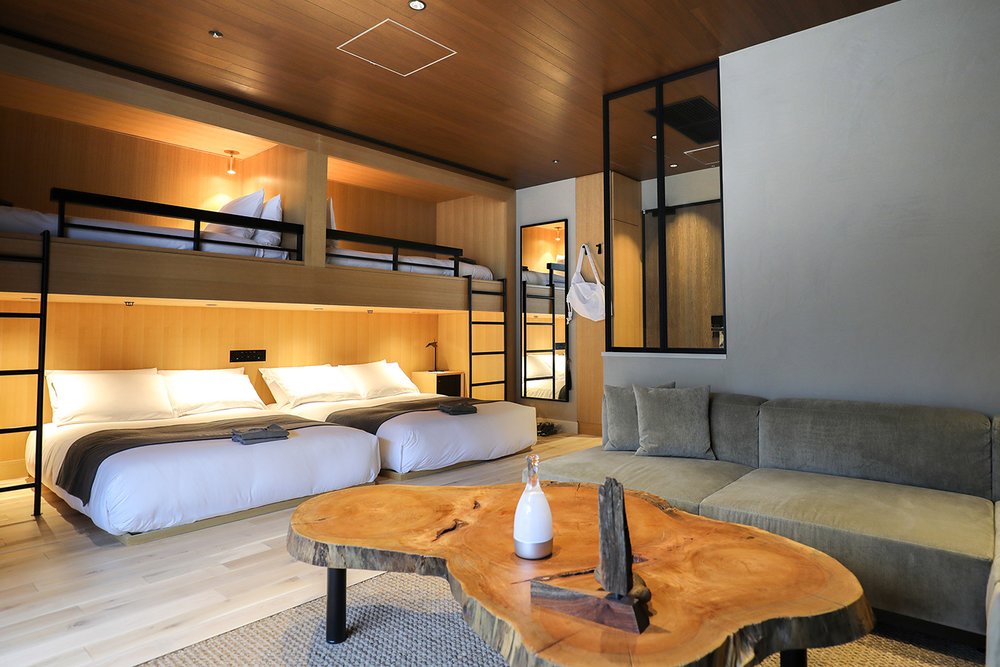 modern hotel room interiors with wooden accents