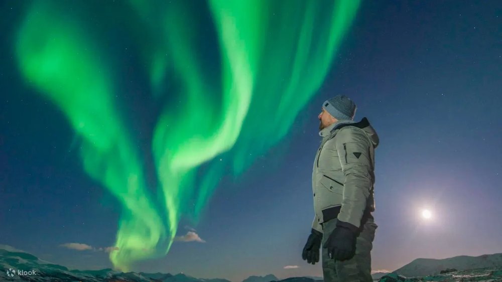 Aurora Borealis through Norway’s scenic countryside