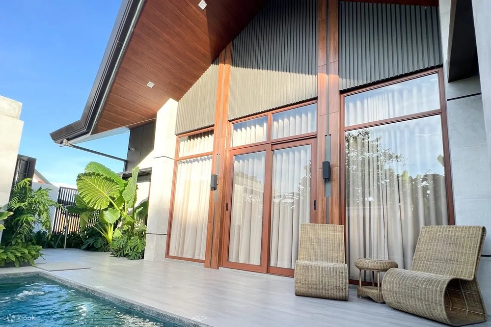 A room in front of the pool