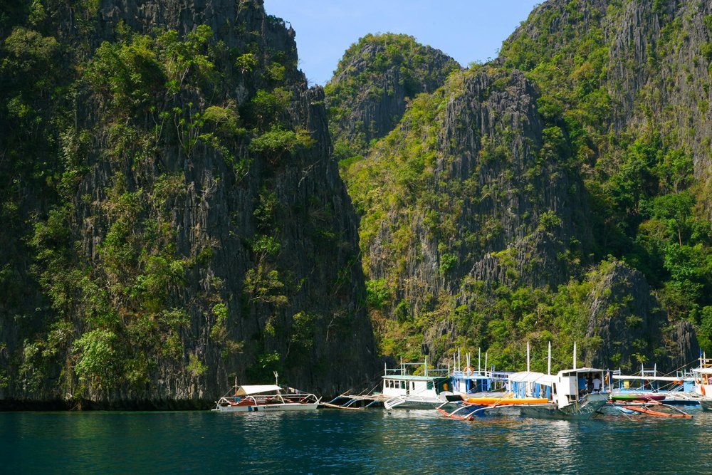 Boats Anchored by the Islands of the Palawan Archipelago