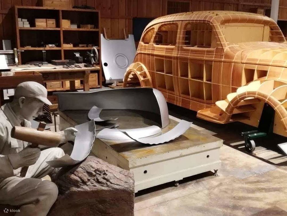 what to do in nagoya - man working at a museum