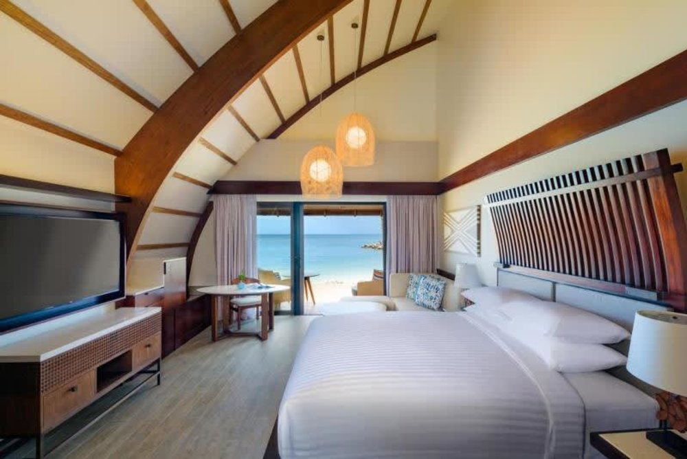 fiji bungalows over the water - hotel room with beach