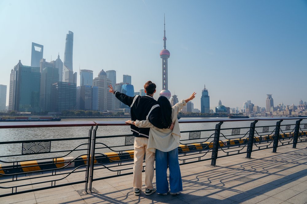 Essential Apps for China Travel - Tourists at The Bund in Shanghai