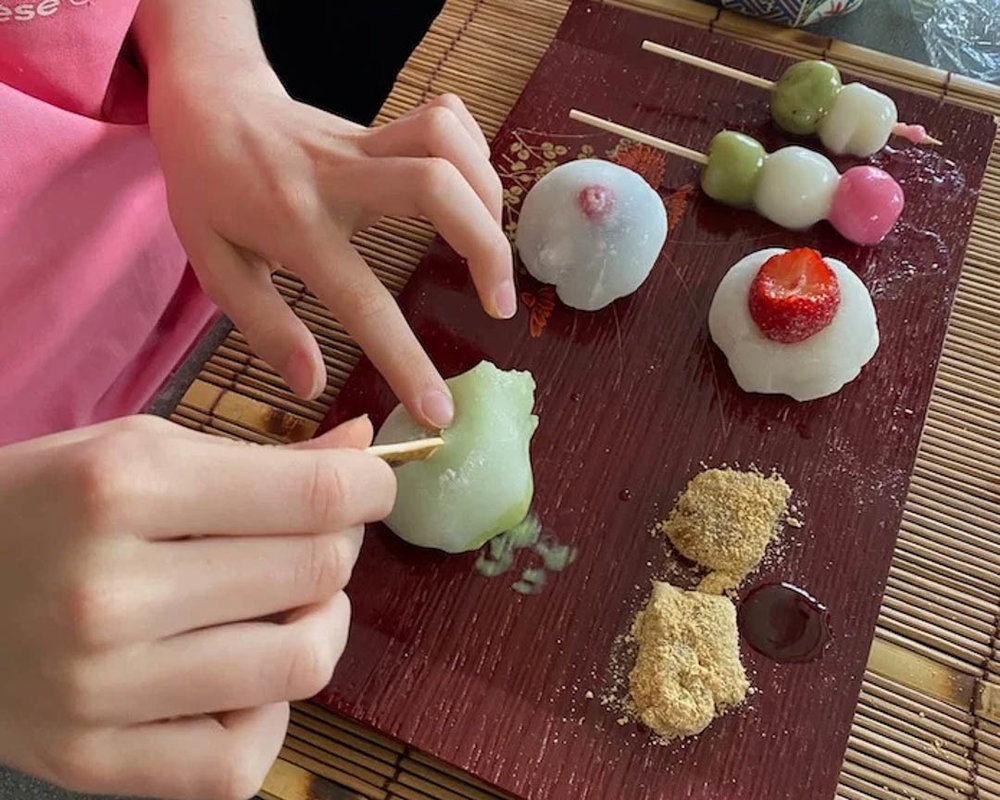 tokyo food - person making mochi by hand