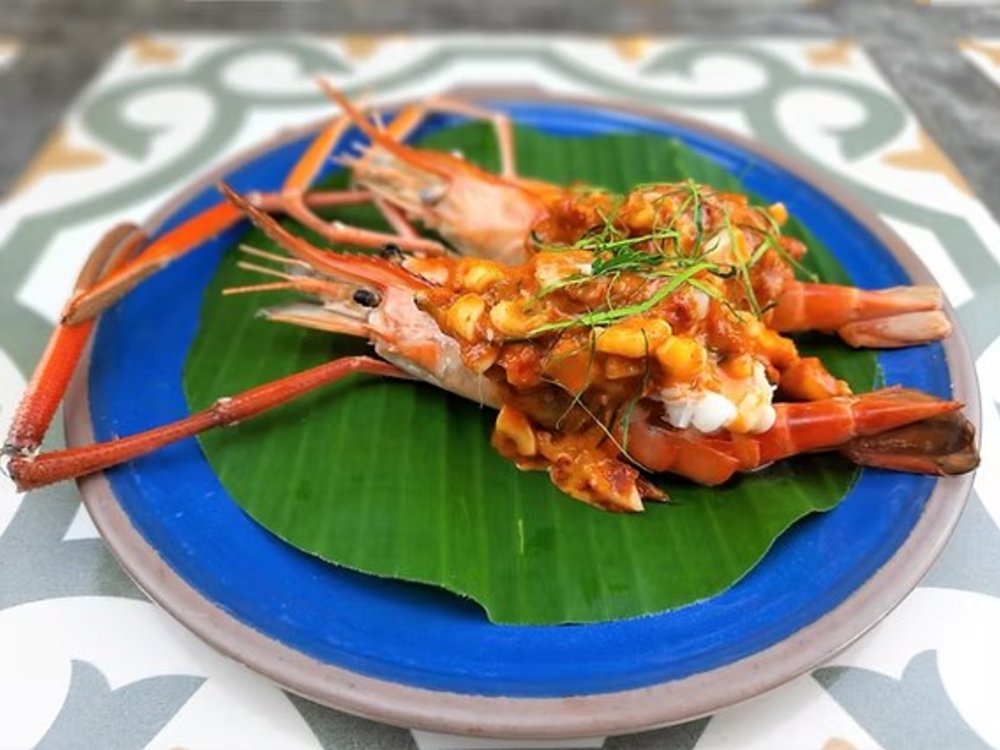 River prawns and calamari in red curry sauce, or Kung maenam (Source: InFusion cooking classes)