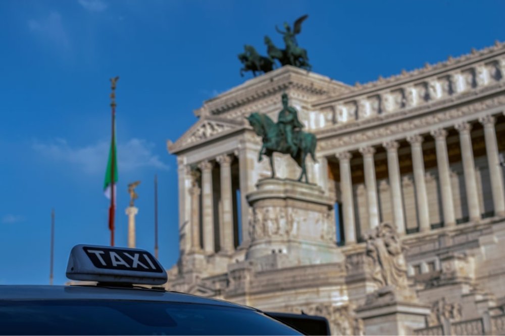Taxi parked in front of the Altare Della Patria in Rome