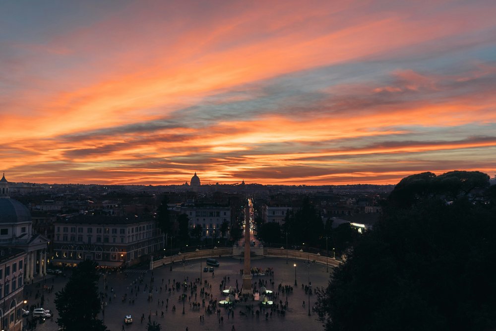 rome at night - plaza with people at sunset
