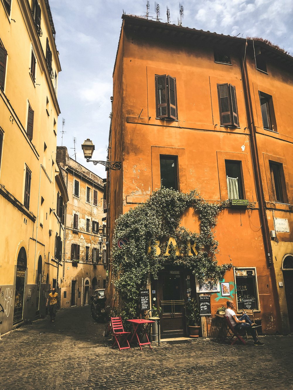 ancient roman buildings - orange and yellow buildings in trastevere