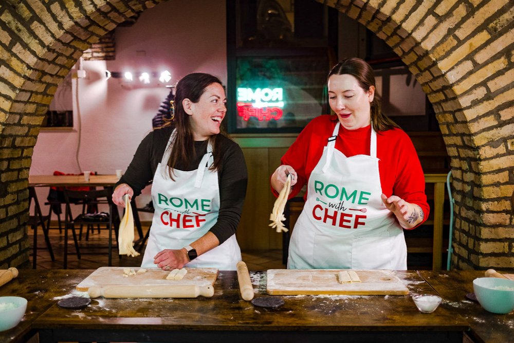 Two women at a pasta-making class
