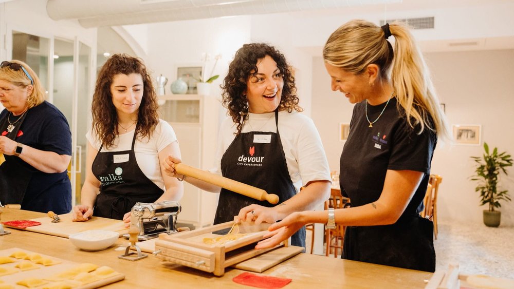 People at a pasta-making class in Rome