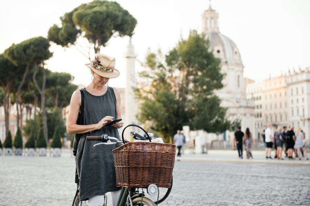 [Bike Rental in Rome] Woman biking in Rome